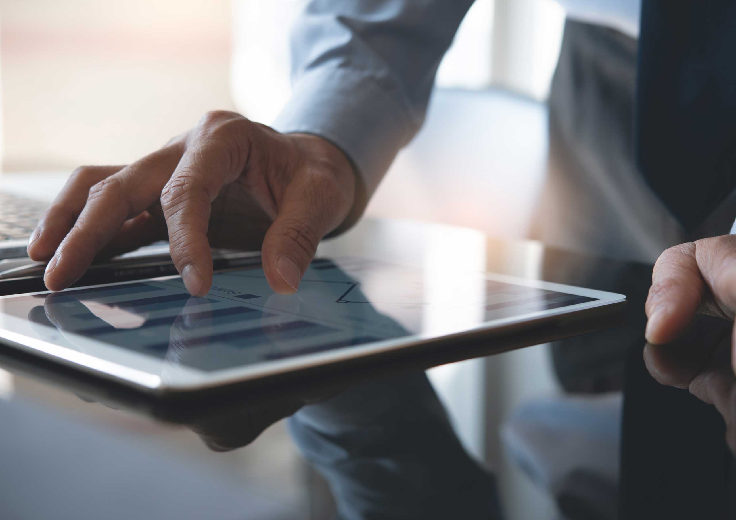 a man working on a tablet
