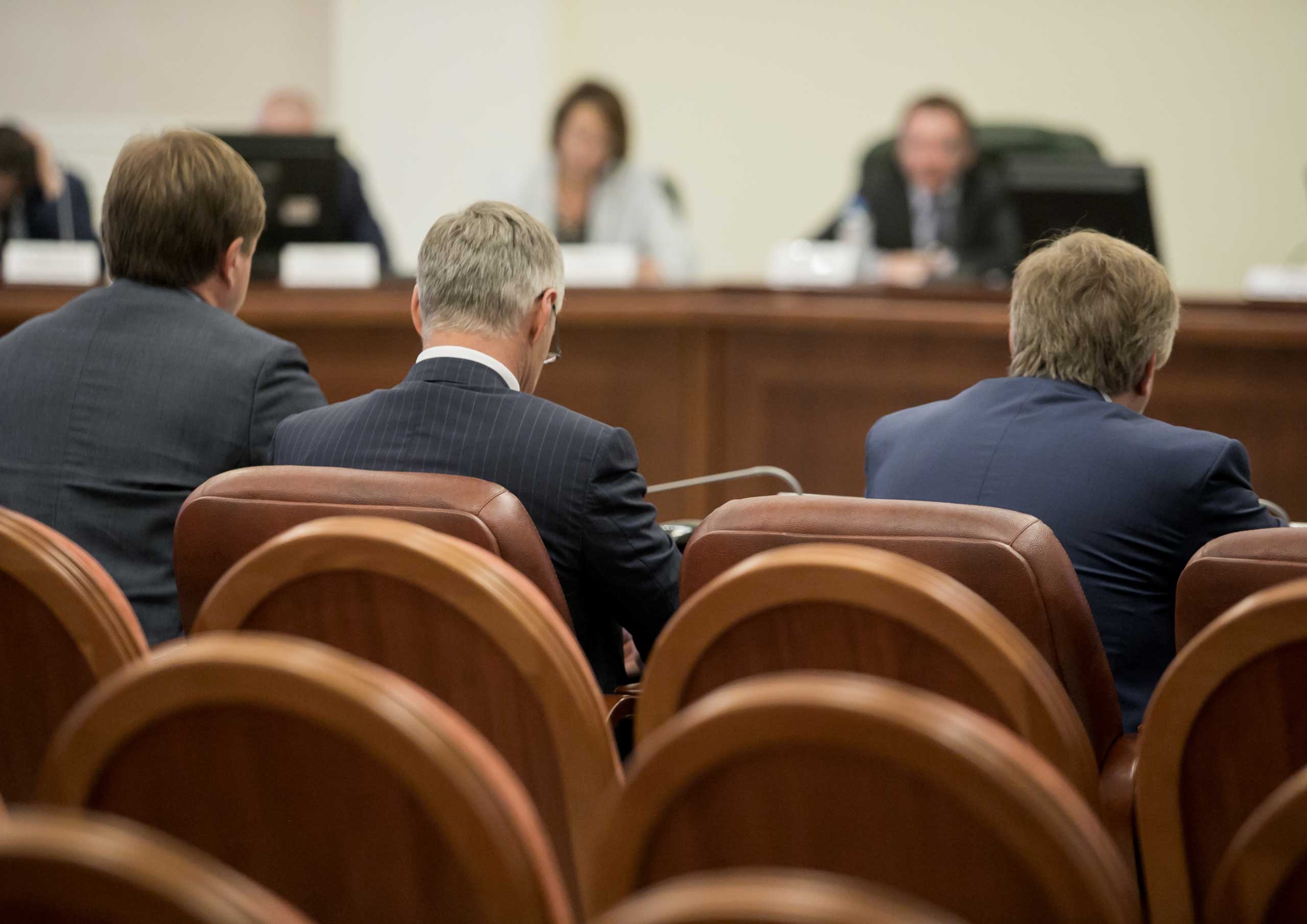 people sitting in a court room
